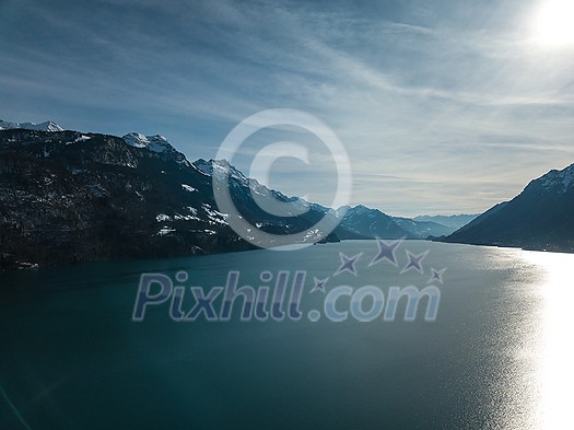 The crystal clear blue water of Lake Brienz in the Swiss Alps - Switzerland from above The crystal clear blue water of Lake Brienz in the Swiss Alps - Switzerland from above