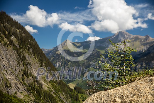 Kandersteg - amazing vacation destination in the Swiss Alps, Switzerland. Couple on a lovely via ferrata Kandersteg - amazing vacation destination in the Swiss Alps, Switzerland. Couple on a lovely via ferrata