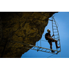 Young people on a via ferrata route in Swiss Alps