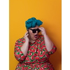 Trendy plus size woman having conversation talking by smartphone over yellow background smiling with an idea or question pointing finger with happy face, number one. High quality photo