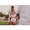 An elderly man in casual clothes with his daughter spends time together in the park on vacation. Family time. Selective focus. High-quality photo