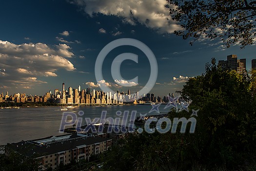 New York City NYC Manhattan Downtown Skyline, viewed from Jersey City, New Jersey, USA. New York City NYC Manhattan Downtown Skyline, viewed from Jersey City, New Jersey, USA.