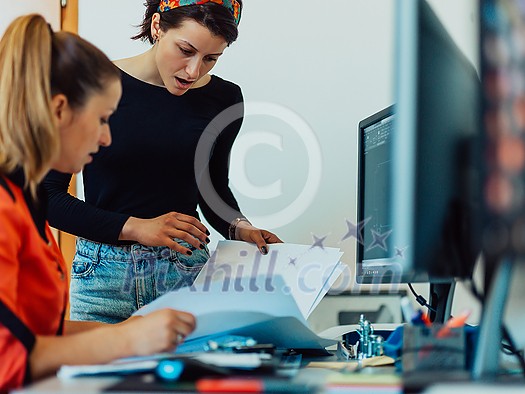 Within the heavy industry, a factory industrial engineer measures with a caliper and on a personal computer Designs a 3D model. High quality photo