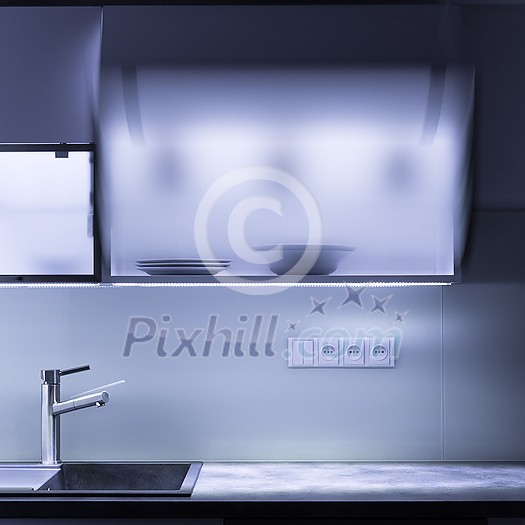 Fully fitted modern kitchen with minimalist design (color toned image) Fully fitted modern kitchen with minimalist design (color toned image)