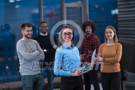 Portrait of a successful creative business team looking at camera and smiling. Diverse businesspeople standing together at startup. Selective focus. High-quality photo
