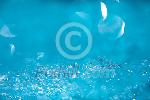 Beautiful water waves - Splashed water wave in clean blue water, clean filtered water ready for drinking Beautiful water waves - Splashed water wave in clean blue water, clean filtered water ready for drinking