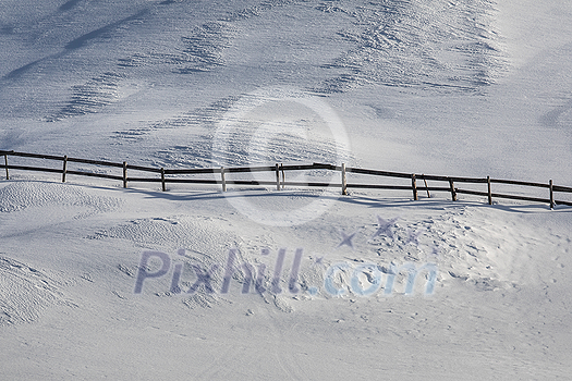 Snowy winter day scenic landscape with tols of snow