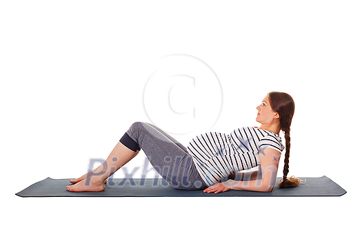 Pregnancy yoga exercise - pregnant woman doing yoga asana Purvottanasana Upward Plank Pose isolated on white background Pregnancy yoga exercise - pregnant woman doing yoga asana Purvottanasana Upward Plank Pose isolated on white background