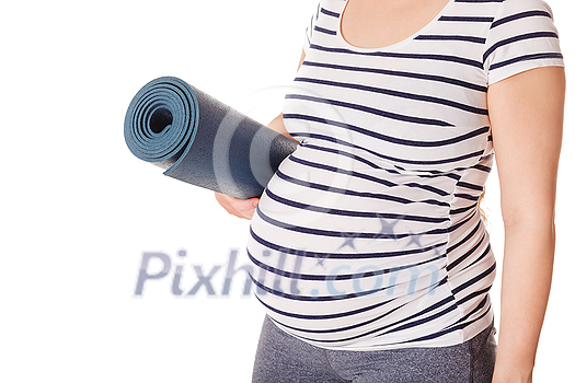 Pregnancy yoga concept - pregnant woman standing with yoga mat close up isolated on white background Pregnancy yoga concept - pregnant woman standing with yoga mat close up isolated on white background