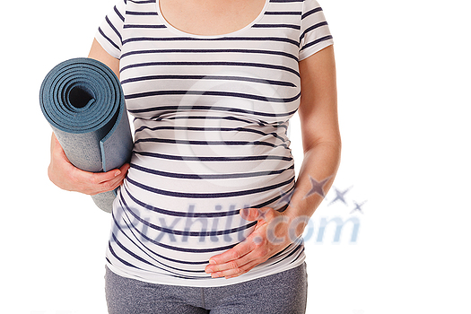Pregnancy yoga concept - pregnant woman standing with yoga mat close up isolated on white background