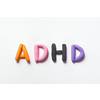 ADHD abbreviation formed of colorful plasticine on white background. Attention deficit hyperactivity disorder and mental health awareness.