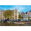 Amsterdam bridge over canal with houses. Amsterdam, Netherlands