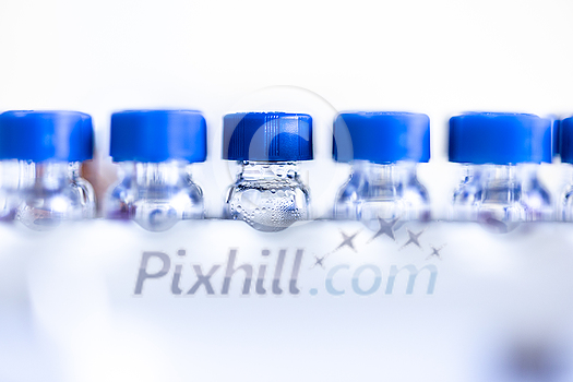 Glass test tubes, flasks in a chemistry lab Glass test tubes, flasks in a chemistry lab