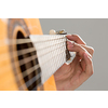 Close up of male hands playing acoustic guitar