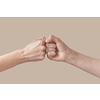 Male and female hands fist put together symbol of friendship isolated on beige background. Brotherhood awesome fists bump as agreement.