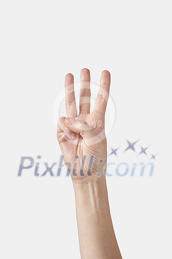 Numeric count on fingers, male hand in vertical position with six, 6, sixth, W in finger alphabet isolated on white background. American sign language. Counting fingers concept. Numeric count on fingers, male hand in vertical position with six, 6, sixth, W in finger alphabet isolated on white background. American sign language. Counting fingers concept.