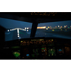 Pilot's hand accelerating on the throttle in  a commercial airliner airplane flight cockpit during takeoff