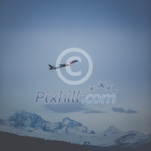 Passenger Airliner flying in the clouds