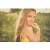 Portrait of young  woman with radiant clean outdoor on a spring/summer sunny day