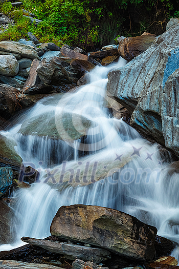 Cascade of Bhagsu waterfall in Bhagsu, Himachal Pradesh, India Cascade of Bhagsu waterfall in Bhagsu, Himachal Pradesh, India