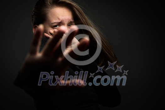 Young woman suffering from a severe depression/anxiety Young woman suffering from a severe depression/anxiety