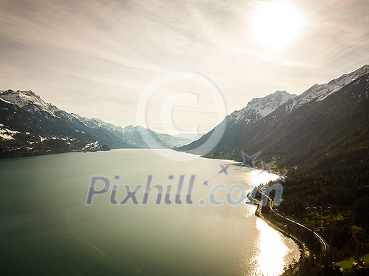 The crystal clear blue water of Lake Brienz in the Swiss Alps - Switzerland from above