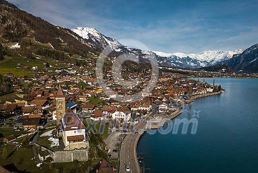 The crystal clear blue water of Lake Brienz in the Swiss Alps - Switzerland from above