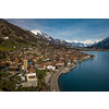 The crystal clear blue water of Lake Brienz in the Swiss Alps - Switzerland from above