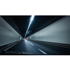 Cars on a highway going through a long modern tunnel (motion blurred image; color toned image)