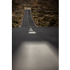 Long road in a mountain valley with a car on it - Teide National Park, Tenerife, Canary islands