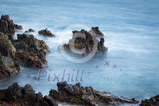 Crashing waves on rocks landscape nature view and Beautiful tropical sea with Sea coast view in summer season Crashing waves on rocks landscape nature view and Beautiful tropical sea with Sea coast view in summer season