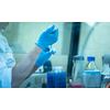 Female researcher carrying out research experiment in a chemistry lab