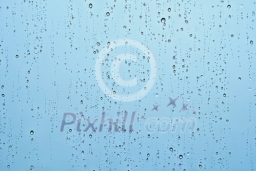 Rain water drops droplets on window glass texture background Rain water drops droplets on window glass texture background