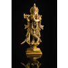 Krishna god Vishnu avatar brass statue isolated on black with reflection