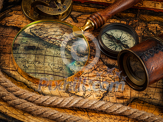 Travel geography navigation concept background - old vintage retro compass with sundial, spyglass and rope on ancient world map Travel geography navigation concept background - old vintage retro compass with sundial, spyglass and rope on ancient world map