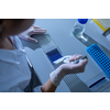 Female researcher carrying out research experiment in a chemistry lab