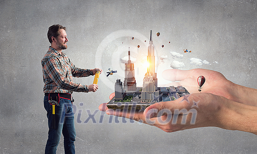 Builder man and his construction exterior model. Mixed media Builder man and his construction exterior model. Mixed media