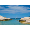 Greek holidays concept. Beautiful romantic island Milos. Yacht boat at Sarakiniko Beach, Milos island , Greece