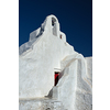 Famous tourist landmark of Greece - Greek Orthodox Church of Panagia Paraportiani in town of Chora on Mykonos island, Greece on sunrise