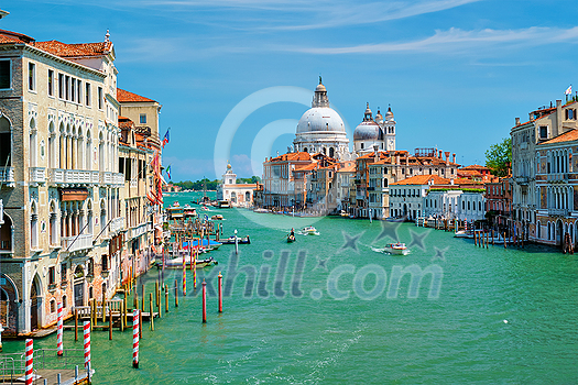 View of Venice Grand Canal with boats and Santa Maria della Salute church in the day from Ponte dell'Accademia bridge. Venice, Italy View of Venice Grand Canal with boats and Santa Maria della Salute church in the day from Ponte dell'Accademia bridge. Venice, Italy
