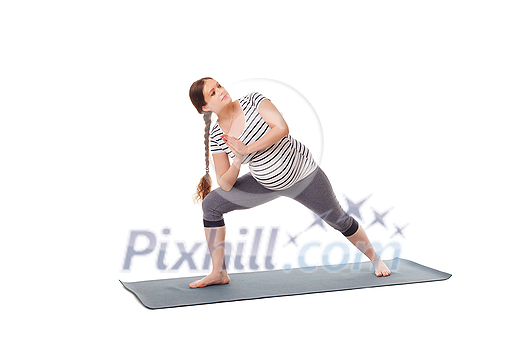Pregnancy yoga exercise - pregnant woman doing asana Utthita Parsvakonasana - Extended Side Angle Pose isolated on white background Pregnancy yoga exercise - pregnant woman doing asana Utthita Parsvakonasana - Extended Side Angle Pose isolated on white background