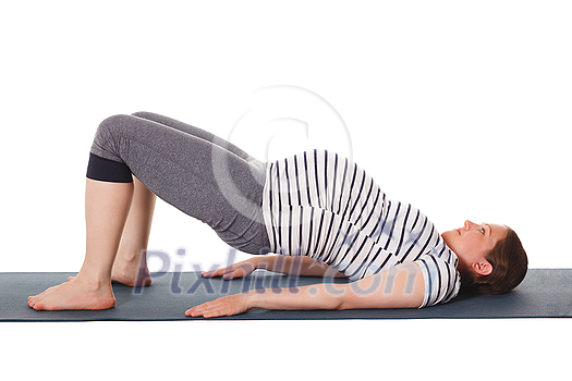 Pregnancy yoga exercise - pregnant woman doing yoga asana Purvottanasana Upward Plank Pose isolated on white background Pregnancy yoga exercise - pregnant woman doing yoga asana Purvottanasana Upward Plank Pose isolated on white background