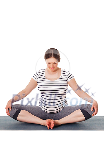 Pregnancy yoga exercise - pregnant woman doing asana Baddha Konasana Bound Angle Pose isolated on white background Pregnancy yoga exercise - pregnant woman doing asana Baddha Konasana Bound Angle Pose isolated on white background