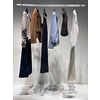 Stylish shop window with designer fashion clothes