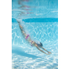 Young woman in a swimming pool performing some synchronized swimming drills