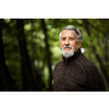 Elderly caucasian male walking outdoors on an autumn, fall day