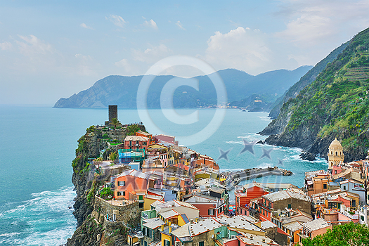 Vernazza village popular tourist destination in Cinque Terre National Park a UNESCO World Heritage Site, Liguria, Italy on sunset view from south Vernazza village popular tourist destination in Cinque Terre National Park a UNESCO World Heritage Site, Liguria, Italy on sunset view from south