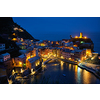 View of Vernazza village popular tourist destination in Cinque Terre National Park a UNESCO World Heritage Site, Liguria, Italy view illuminated in the night from Azure trail