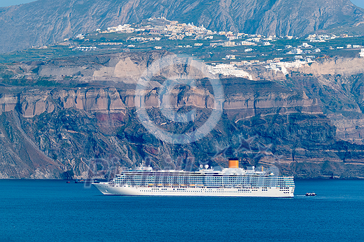 Cruise liner ship vessel in Aegean sea near Santorini island in Greece Cruise liner ship vessel in Aegean sea near Santorini island in Greece