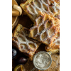 Close up dark rustic style Apple strudel. Sliced homemade apple strudel, top view.